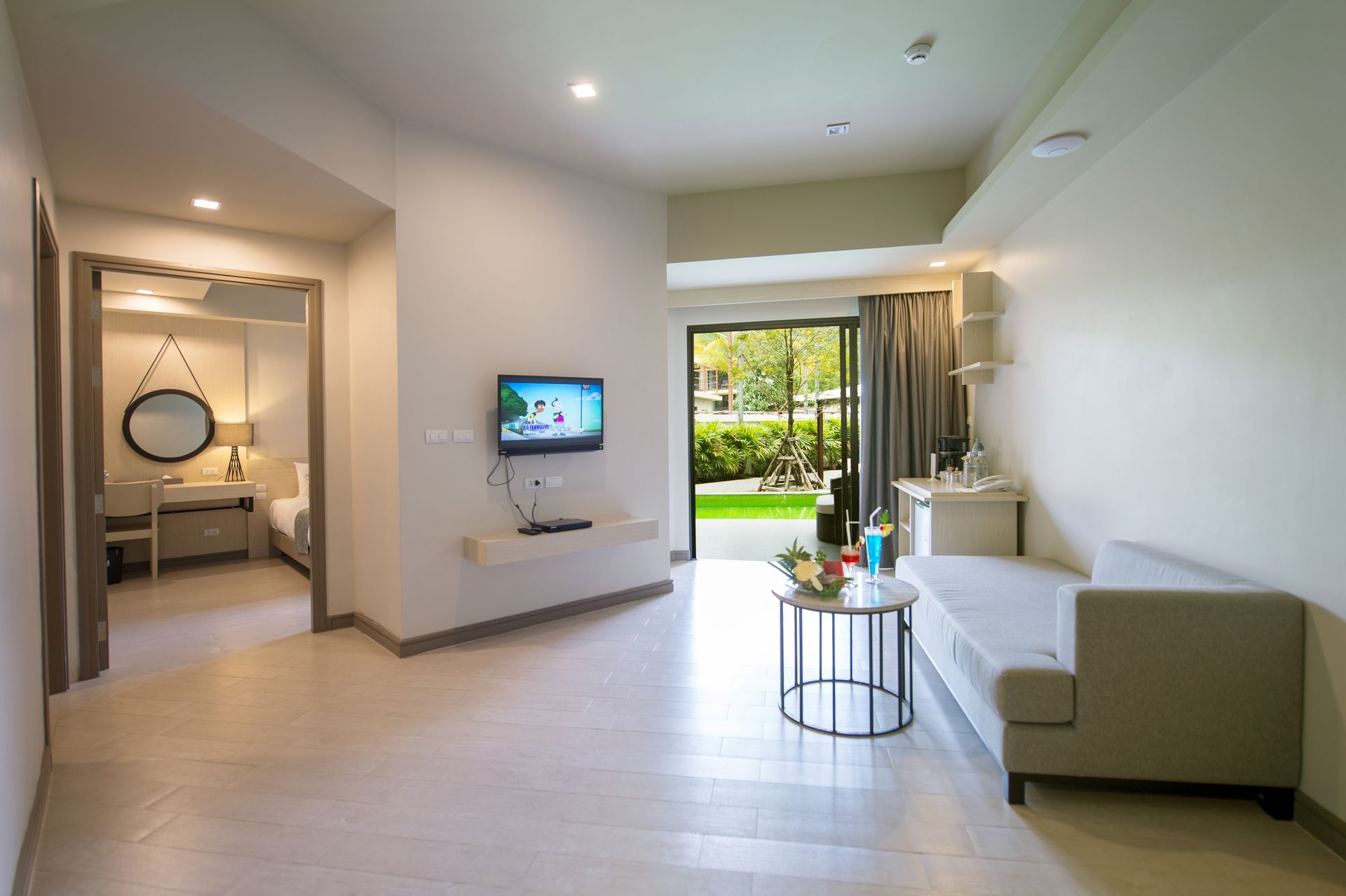 Living room opening to the pool terrace