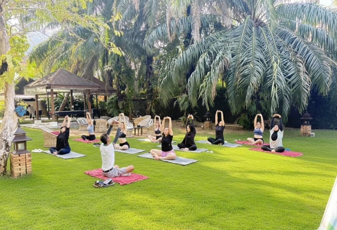 Morning yoga on the lawn